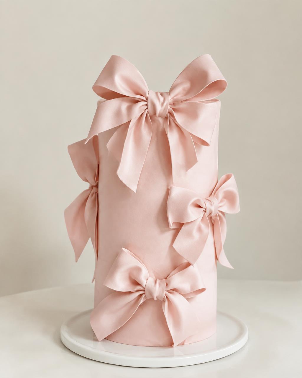 Blush bow cake